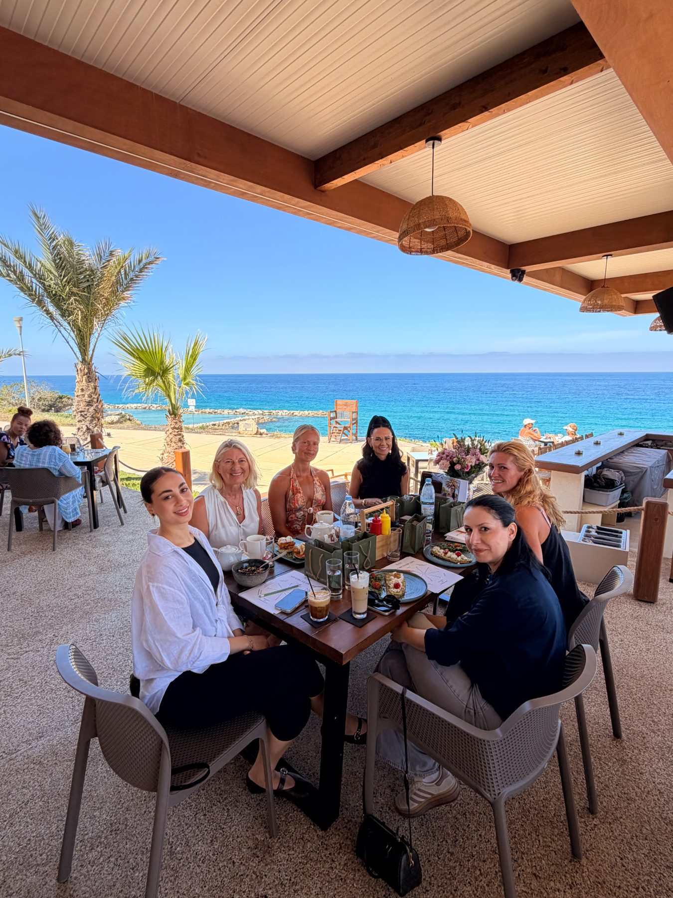 The women of WPA at the first Power Breakfast, overlooking the sea in Paphos